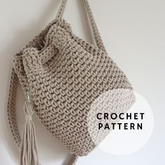 a crochet purse with tassels hanging from it's side and the words crochet pattern below