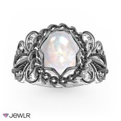 This beautiful vintage-inspired ring with a 10x8mm cabochon stone and elegant filigree detailing on the band will make a stunning addition to your jewelry collection. The metal has a special antique finish to give the ring a true vintage look. Personalize with a special engraving along the inside of the band. Elegant Metal Rings With Intricate Design, Silver Oval Cabochon Rose Cut Diamond Jewelry, Elegant Antique Finish Rings For Formal Occasions, Elegant Formal Rings With Antique Finish, Silver Jewelry With Rose Cut Oval Cabochon Diamonds, Silver Jewelry With Rose Cut Diamonds In Oval Cabochon, Elegant Silver Opal Ring With Bezel Setting, Elegant Antique Finish Wedding Rings, Victorian Oval Filigree Ring With Cabochon