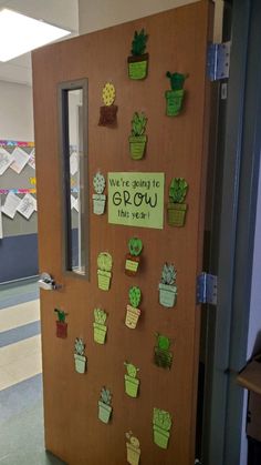 a door decorated with magnets that say we're going to grow this year