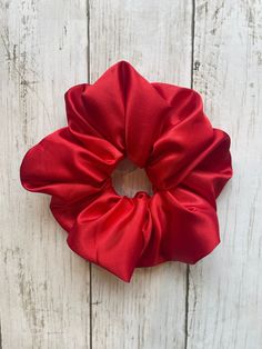 Red satin XL scrunchie jumbo oversized hair tie.  Elevate your hair with this large luxurious scrunchie.  Approximately 6-7 inches wide.  Soft finish is healthier for your hair, reducing breakage.  Made with lots of love and care. Red Hair Accessories Walmart, Cutout Clothes, Red Hair Tie, Red Scrunchie, Xl Scrunchie, Red Hair Accessories, Dreadlock Style, Halloween Inspo, Lots Of Love