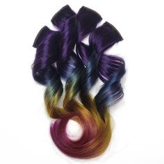 Purple Titanium Quartz colored clip in hair extensions are a Metallic Purple to Emerald Blue, Yellow and Fuchsia Violet The Details: •4 Piece set •Each piece is about 1.5" wide•These clip-in hair extensions are crafted from premium Double Drawn 100% Remy Human Hair, providing durability and the potential to be re-dyed, if desired. These premium human-hair extensions can be styled with the same methods used for your own hair, allowing for maximum versatility and customized looks.•Optional Root Co Root Smudge, Root Color, Titanium Quartz, Emerald Blue, Quartz Colors, Color Melting, 100 Remy Human Hair, Remy Human Hair Extensions, Heat Styling Products