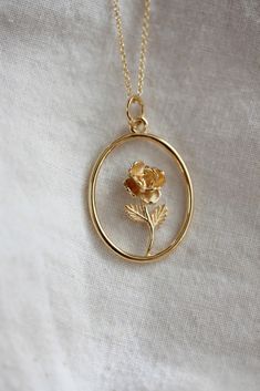 A golden garden where blooms last forever. Detailed rose with leaves in a golden frame. Pendant measures approximately 1" Gold vermeil 18" gold fill chain Rose With Leaves, Magic Rose, قلادات متدلية, Golden Garden, 23rd Birthday, Golden Frame, Magical Jewelry, Golden Jewelry, Jewelry Accessories Ideas