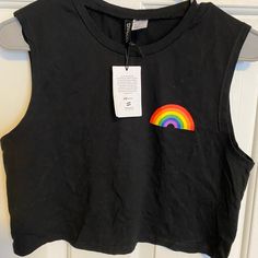 Black Crop Top T-Shirt, Nwt. Size Small T. Size Small. Good Condition. Trendy Rainbow Top For Pride, Casual Black Tops With Rainbow Print, Black Crew Neck Muscle Tee For Summer, Basic Crew Neck Tank Top With Graphic Print, Trendy Rainbow Sleeveless Top, Trendy Crew Neck Top For Pride, Casual Rainbow Sleeveless Top, Casual Rainbow Pride Tops, Casual T-shirt For Pride Streetwear