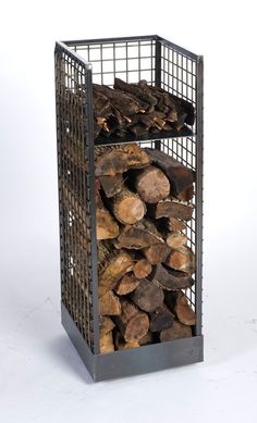 a stack of firewood in a metal cage on top of a white background with clippings