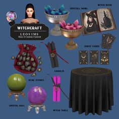 a bunch of items that are sitting on top of a blue tablecloth and in front of a witch's hat