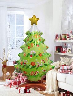 a christmas tree in the middle of a living room filled with presents and other holiday decorations