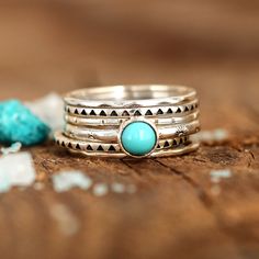 A set of 6 stackable rings with Turquoise stone. Boho chic western style ring Made of sterling silver. **Each stone is unique, the buyer will get a random beautiful Turquoise from the current collection.** Metal: Solid sterling silver US Ring Size: Choose Size Width: 20mm Gemstone: Turquoise Gemstone Color: Turquoise ✈ Free Shipping (USPS) 🎁 Free Gift Box ↻ 60 Days Return ⌛ 24 Handling Time ** GET 15% OFF COUPON ** Visit 👉 boho-magic.com/join Join and get coupons, exclusive offers, updates, an Bohemian Stackable Turquoise Ring, Stackable Sterling Silver Turquoise Ring, Luxury Stackable Turquoise Ring In Sterling Silver, Bohemian Stackable Rings For Promise, Bohemian Sterling Silver Stackable Midi Rings, Bohemian Stackable Promise Rings, Bohemian Adjustable Stackable Turquoise Ring, Adjustable Stackable Bohemian Turquoise Ring, Minimalist Silver Turquoise Stackable Ring