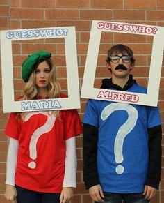 two people wearing costumes with question marks on them