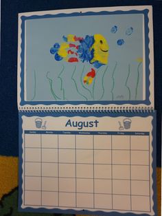 two calendars with fish drawn on them, one is blue and the other is yellow