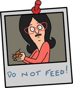 a woman with glasses holding a piece of food in her hand and the caption do not feed