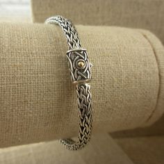 "Celtic Dragon Weave Bracelet. Available in four sizes for Ladies & Gents Small 6.5\" Small 7\" Medium 7.5\" Medium-Large 8\" Celtic slide lock clasp. 11 mm long with 18K accent Weave 4.5 mm wide. Nicely boxed with silver cloth. Celtic Dragon Weave Bracelet by Keith Jack Imported from Canada Signed by the Artist" Norse Necklace, Celtic Knot Bracelet, Weave Bracelet, Celtic Dragon, Ladies Gents, Irish Celtic, Woven Bracelets, Bracelet Sterling Silver, Gold Accent