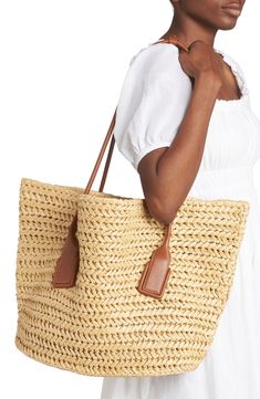 Crocheted raffia brings warm-weather charm to this roomy tote named for the elegantly arched over-the-shoulder handles. Open top Top carry handles Removable zip pouch Flat base for stability Raffia with leather trim Made in Italy Designer Handbags Luxury Brown Crochet Bag For Shopping, Luxury Crochet Bag With Braided Handles For Shopping, Luxury Natural Crochet Bag For Shopping, Luxury Rectangular Beach Bag For Shopping, Luxury Rectangular Straw Bag With Rolled Handles, Luxury Beach Bag With Leather Handles, Luxury Crochet Tote Bag With Leather Handles, Luxury Rectangular Beach Bag, Elegant Straw Bag With Woven Leather And Double Handle