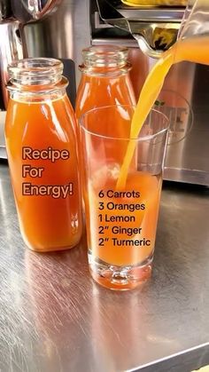 orange juice being poured into two glasses with recipe for energy written on the front and side