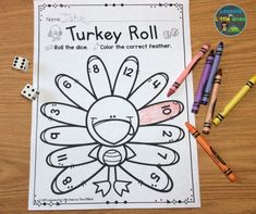 a turkey roll game with crayons and markers