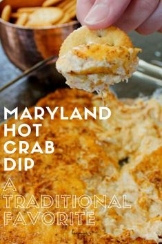 a hand holding a piece of food over a casserole dish with the title text maryland hot crab dip