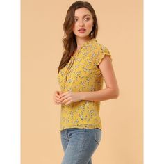 Lightweight and breezy, the shirt is perfect for sunshine styling. A floral print updates this top, perfect for adding a summer pattern to warm-weather looks. Made of a lightweight fabric, the printed style has a self-tie decor at the neckline and a ruffled trim. It has a loose fit that falls to the hip, so you can easily tuck it into skirts or jeans. Trendy Ditsy Floral Print Top For Day Out, Casual Floral Print Tops For Daytime, Chic Ditsy Floral Print Tops For Vacation, Casual Floral Print Blouse For Daytime, Casual Ditsy Floral Print Blouse For Vacation, Casual Blouse With Ditsy Floral Print For Vacation, Casual Vacation Blouse With Ditsy Floral Print, Daytime Floral Print Blouse, Chic Daytime Floral Print Tops