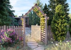 a garden with a wooden gate and flowers