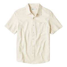 Cut and sewn from soft, loose-weave cotton Beige Camp Collar Top With Relaxed Fit, Beige Cotton Camp Shirt With Relaxed Fit, Cotton Tops For Casual Gatherings, Unstructured Cotton Tops For Casual Gatherings, Beige Cotton Top With Placket, Beige Cotton Buttoned Camp Shirt, Cotton Shirt With Placket For Casual Gatherings, Cotton Shirt With Placket For Casual Wear, Casual Unstructured Tops With Rolled Sleeves