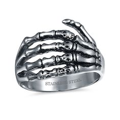 Bring your dark side to the forefront when you wear this thrilling Gothic-style oxidized skeleton hand wrap band for men. Created in stainless steel This choice wraps your finger with a sculpted skeleton hand. Four skulls add spine-chilling detail while the oxidized finish lends depth and dimension. Skull Rings For Men, Hades Daughter, Biker Rings Mens, Skeleton Jewelry, Goth Biker, Gothic Skeleton, Bone Ring, Chic Rings, Skull Rings