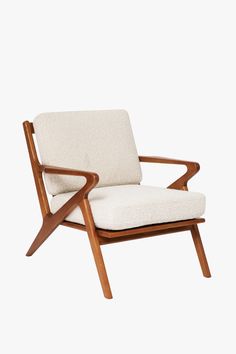 a white chair with wooden arms and legs