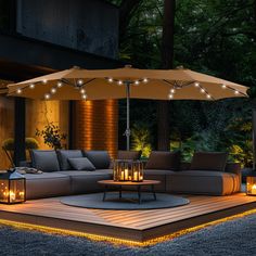 an outdoor living area lit up with lights