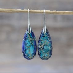 Natural Gemstone Dangle Earrings. Lovely Blue And Gold With Silver Hook. Purchased From Etsy, See Photos For Description. Never Worn. Blue Teardrop Earrings For Summer Gift, Blue Bohemian Drop Earrings, Summer Blue Teardrop Earrings As Gift, Bohemian Blue Drop Earrings, Blue Drop Earrings With Natural Stones, Zambia, Earrings Color, Blue And Gold, Natural Gemstones