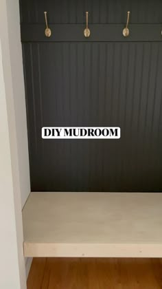 an empty room with the word diy mudroom on it's side wall