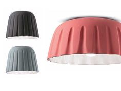 three different colored lamps with one light on the top and one in the bottom,