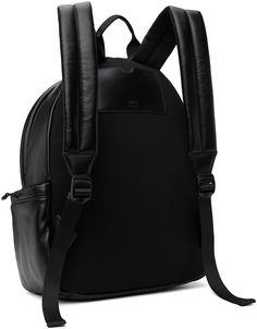 Nappa sheepskin backpack in black. · Rolled webbing carry handle · Adjustable padded shoulder straps · Logo hardware at face · Press-release straps and zip pocket at face · Patch pocket at sides · Logo-embossed patch pocket at back face · Two-way zip closure · Padded mesh laptop compartment at interior · Twill lining · Logo-engraved hardware · H15.5 x W12.5 x D6.5 Supplier color: Black Black Travel Bag With Removable Padding, Travel Bag With Removable Padding In Black, Black Travel Backpack With Leather Trim, Black Backpack With Leather Trim For Travel, Black Leather Backpack With Leather Trim, Black Leather Backpack With Leather Trim For Travel, Black Backpack With Leather Trim For Everyday Use, Black Backpack With Detachable Strap For Commuting, Everyday Black Backpack With Leather Trim