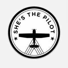 the logo for she's the pilot is shown in black and white with stars