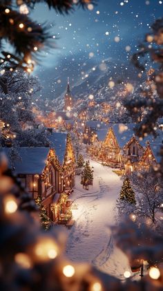 a snowy village with christmas lights on the trees