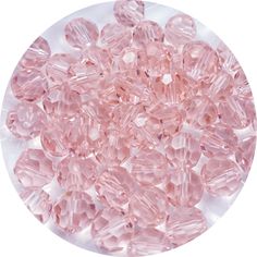 pink crystal beads on a white background