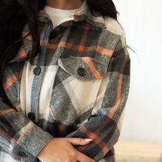 Get ready for your new favorite go-to plaid shacket! It will keep you cozy and warm as our weather starts to to cool. Model is 5'8" and is wearing a size Small Fabric: 60% Polyester, 40% Recycled Polyester