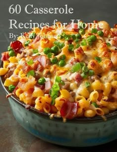 a casserole dish with bacon, cheese and green onions in it on a table