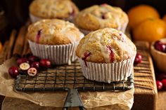 cranberry orange muffins on a cooling rack