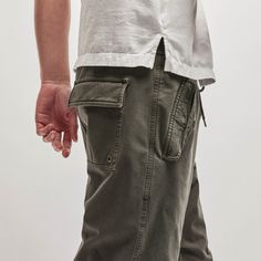 Our Cotton Terry Flight Pant is made with heavier Italian fabric that has a sturdier yet soft hand feel. This pant has 4-way stretch and elasticized pull on waist band with drawcord for comfort. Style details include functioning button fly, cuffed leg opening, knee tuck details, and snap button flap pockets. Relaxed fit.Additional Information:• 45% Cotton, 46% Lyocell, 6% Elastane• This garment was dyed using a special pigment process to give each garment a unique look that will evolve and fade Decorative Bath Towels, Denim Polo, Sweat Top, Backpack Tote Bag, Denim Cotton, Italian Fabric, Soft Hands, Comfort Style, Soft Hand