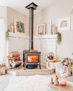 an instagram page with a wood burning stove in the middle and pictures on the wall