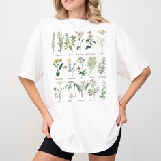 Hi there! Thank you so much for stopping by my shop. Your support of my small business means the world :) Medical and culinary... Here's a list of herbs that the common gardener, or witchy herbalist gardener, either knows or grows. *✧  How to order  *✧ 1. Choose your shirt color.  2. Select your size.  It's that simple :)  *✧  Sizing  *✧   Please swipe to see the size chart. Measurements are in inches.  If you would like a tighter fit size down. For an oversized fit size up one or two sizes.  *✧ Fabric and Details *✧ Comfort Colors Unisex Shirts: *✧  100% ring-spun cotton *✧  Medium fabric (6.1 oz/yd² (206.8 g/m *✧  Relaxed fit *✧  Sewn In label *✧  Soft Washed *✧  No side seam Printed in the USA and made to order.  *✧ Fabric and Details *✧ Please note: due to variations amongst computer m Cottage Core Shirt, Coquette Clothes, Clothes Green, Botanical Shirt, Comfort Colors Shirt, Green Witch, Gildan Sweatshirts, Medicinal Herbs, Unisex Shirts