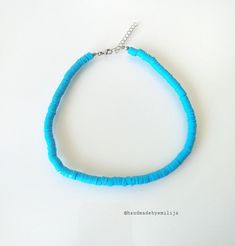 Blue Heishi Bead necklace 🌊 ✨MATERIALS * Stainless steel clasp * Polymer clay beads ✨ SIZE * Adjustable of 35cm + extension chain 5cm * Bead size = 6mm 💛 Visit my store for more handmade jewelry : handmadebyemilija.etsy.com 🌸 Instagram: @handmadebyemilija Trendy Blue Choker With Tiny Beads, Blue Single Strand Choker Jewelry, Trendy Blue Beaded Choker, Blue Single Strand Heishi Bead Necklaces, Blue Single Strand Heishi Beaded Necklaces, Blue Single Strand Heishi Beads Necklace, Trendy Blue Heishi Beads Jewelry, Blue Single Strand Heishi Beaded Necklace, Blue Single Strand Choker As Gift