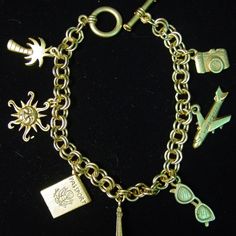 Nwot Antique Gold Jonette Jewelry 'Travel Theme' 7" Charm Bracelet With Toggle Closure. Charms = Palm Tree, Sun, Passport, Eiffle Tower Sunglasses, Plane And Camera. Travel Charm Bracelet, Travel Charms, Jewelry Travel, Travel Theme, Travel Themes, Travel Jewelry, Botanical Art, Palm Tree, Womens Jewelry Bracelets