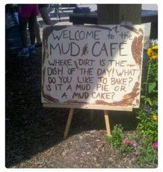 a sign that says welcome to the mud & cafe where dirt is the dish of the day what do you like to bake it at a mud pie or a mud cake?