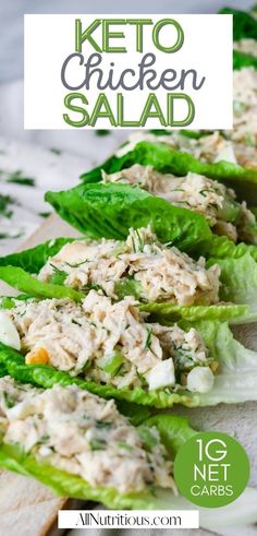 lettuce wraps filled with chicken salad on top of a wooden cutting board and text overlay that reads keto chicken salad