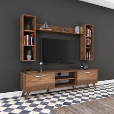 an entertainment center with bookshelves and a television on it's stand in a living room