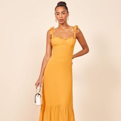 Nikita Dress Perfect Classic And Flattering Midi Dress In A Color Sold Out Online! The Ochre Nikita Is A Golden Yellow, Gold, Or Mustard Yellow Color Pricing Is Somewhat Firm As I Would Keep It If I Had An Event To Wear It To! $278 Ankle Alert. The Nikita Is Fitted In The Bodice And Waist With A Relaxed Fitting Skirt. This Midi Length Dress Has A Ruffle Edged Neckline, Adjustable Strap Ties, And A Trumpet Skirt. It Gives You A Pretty Good Balance Of Comfort And Shape. - Center Back Zipper - Line Elegant Yellow Maxi Dress With Ruffles, Elegant Yellow Ruffled Maxi Dress, Yellow Sleeveless Ruffled Midi Dress, Yellow Sleeveless Midi Dress With Ruffles, Chic Sleeveless Mustard Maxi Dress, Chic Mustard Maxi Length Dresses, Chic Mustard Maxi Dress, Mustard Sundress In Maxi Length, Chic Fitted Mustard Maxi Dress