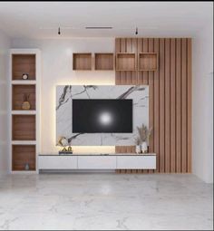 a living room with marble floors and wooden walls, white cabinets and a flat screen tv mounted on the wall