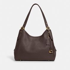 is a stylish and functional bag that is perfect for everyday use. It features a spacious interior with multiple compartments, a comfortable shoulder strap, and a stylish exterior. #lorishoulderbag #shoulderbag #fashion Autumn Closet, Fall Wishlist, Uni Bag, Shoulder Bag Coach, Dream Bags, Purse Essentials, Suede Fashion, Coach Outlet, Bag Collection