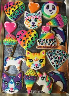 decorated cookies in the shape of animals and hearts