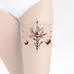 a woman's thigh with a tattoo on it and a flower in the middle