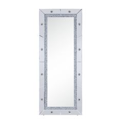 a white mirror with silver trimmings on it