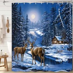 two deer standing in the snow near a cabin on a snowy night shower curtain set